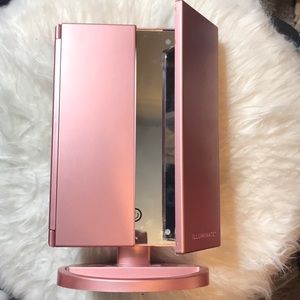 Tri fold light up makeup mirror with magnify